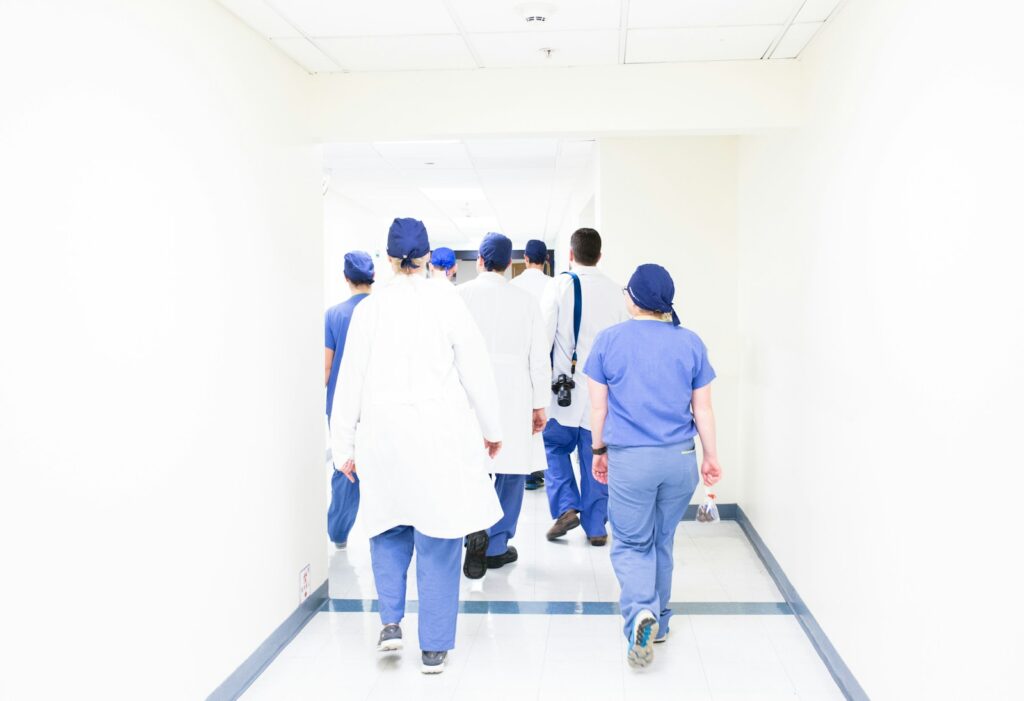 Global patient safety report 2024 group of doctors walking on hospital hallway